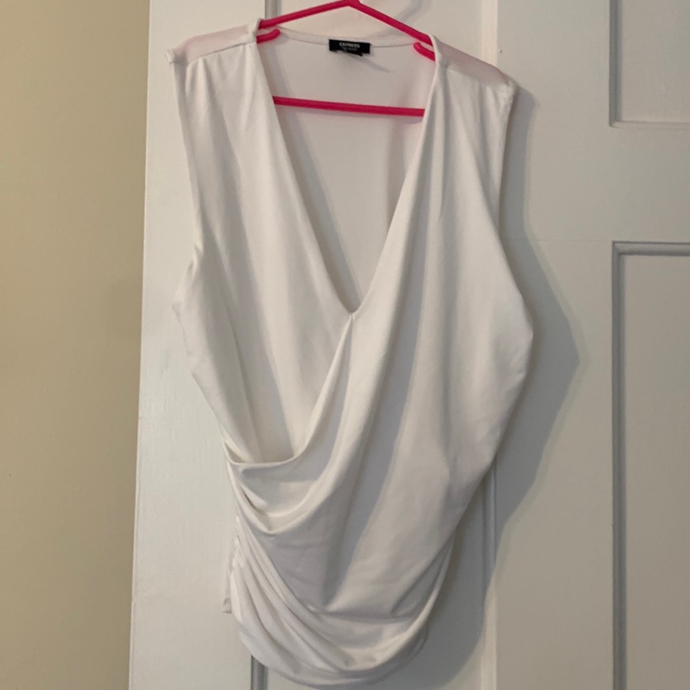 Super cute white sleeveless top from Express great condition